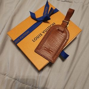 Authentic Louis Vuitton luggage tag